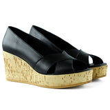 Astrid Siyah Hakiki Deri Çapraz Bantlı Mantar Taban Görünümlü Dolgu Topuklu Sandalet